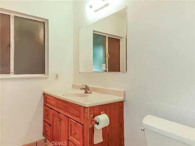 a bathroom with a sink and a toilet