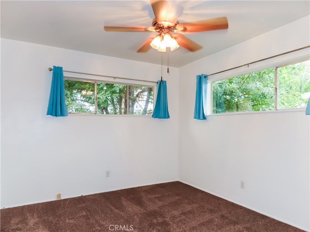 6688 Montclair Drive Riverside, CA 92504 - Photo 16 of 21 an empty room with a window