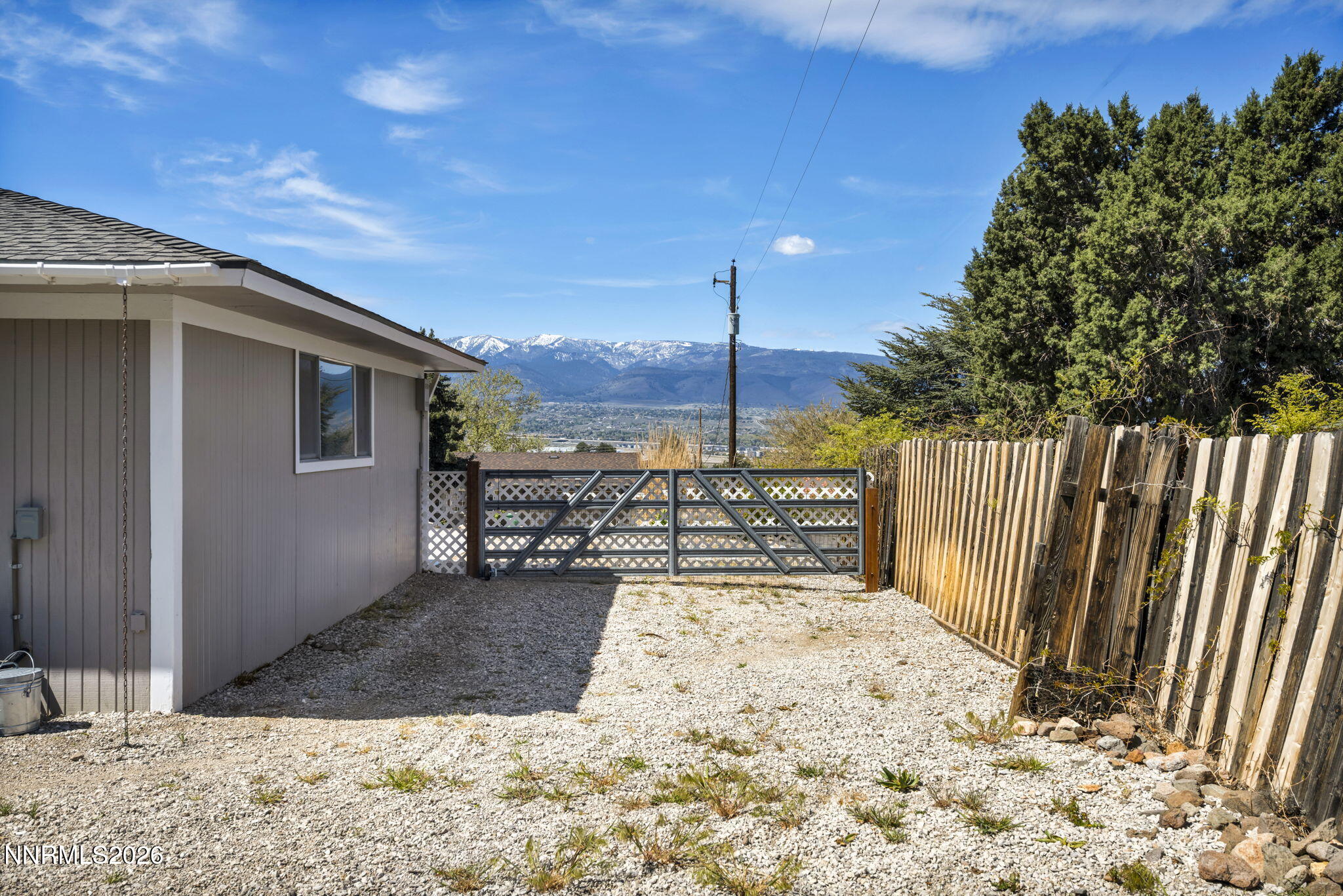 14190 Rim Rock Drive Reno, NV 89521 - Photo 54 of 68 a view of a terrace with wooden fence
