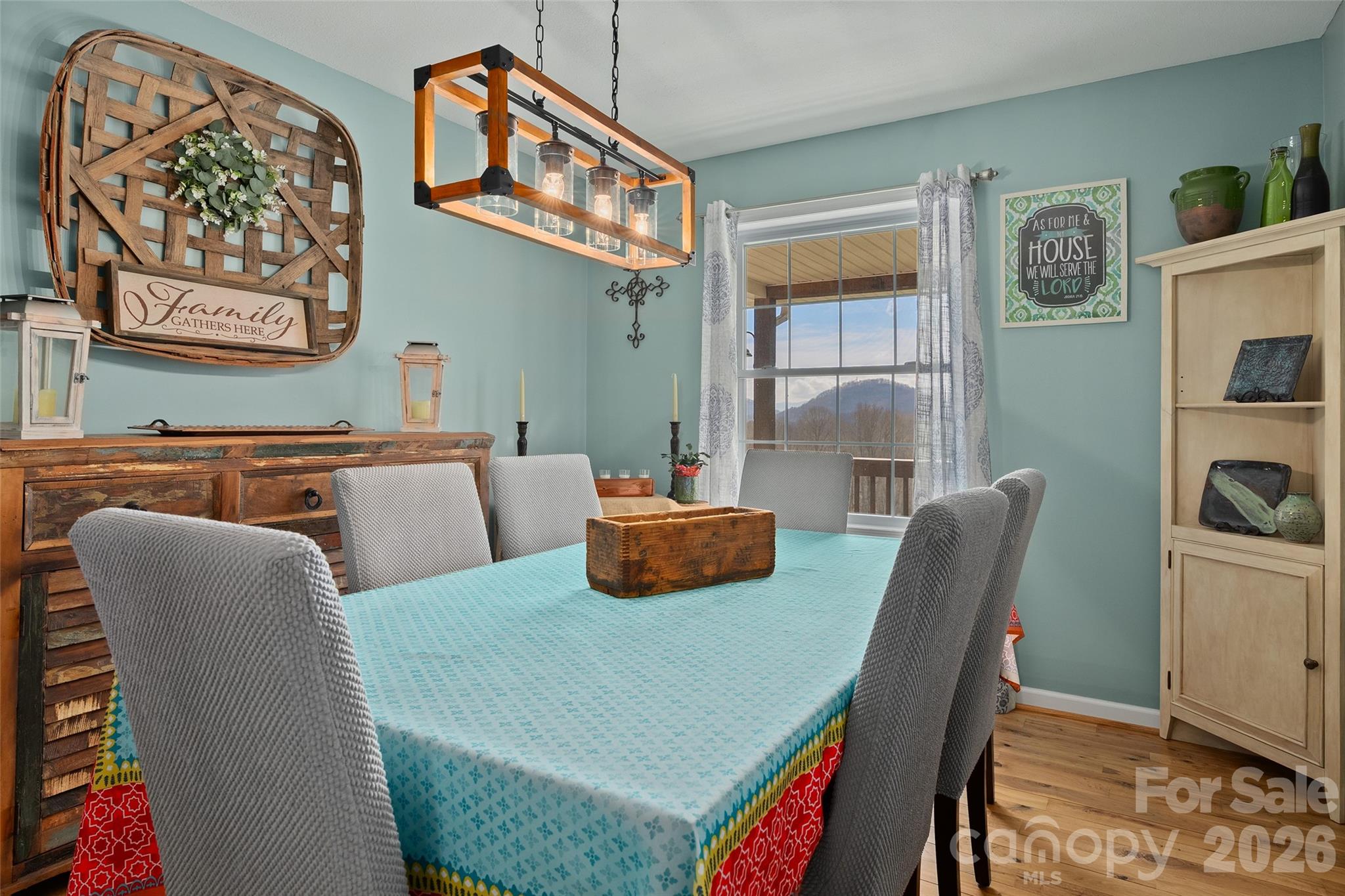 371 Ned Cove Road Waynesville, NC 28785 - Photo 13 of 44 a bedroom with furniture and wooden floor