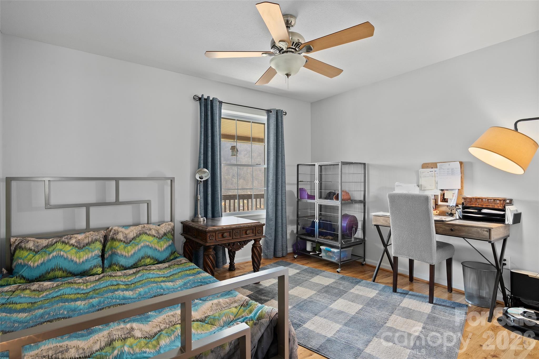 371 Ned Cove Road Waynesville, NC 28785 - Photo 20 of 44 a living room with furniture and a piano