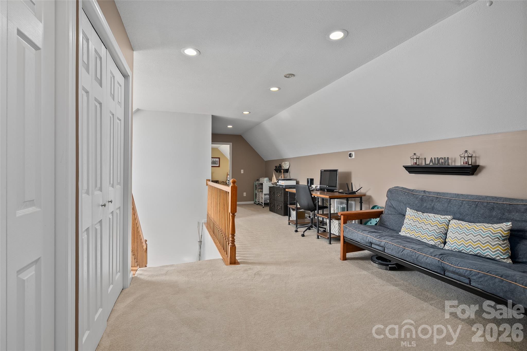 371 Ned Cove Road Waynesville, NC 28785 - Photo 29 of 44 a living room with furniture and a couch
