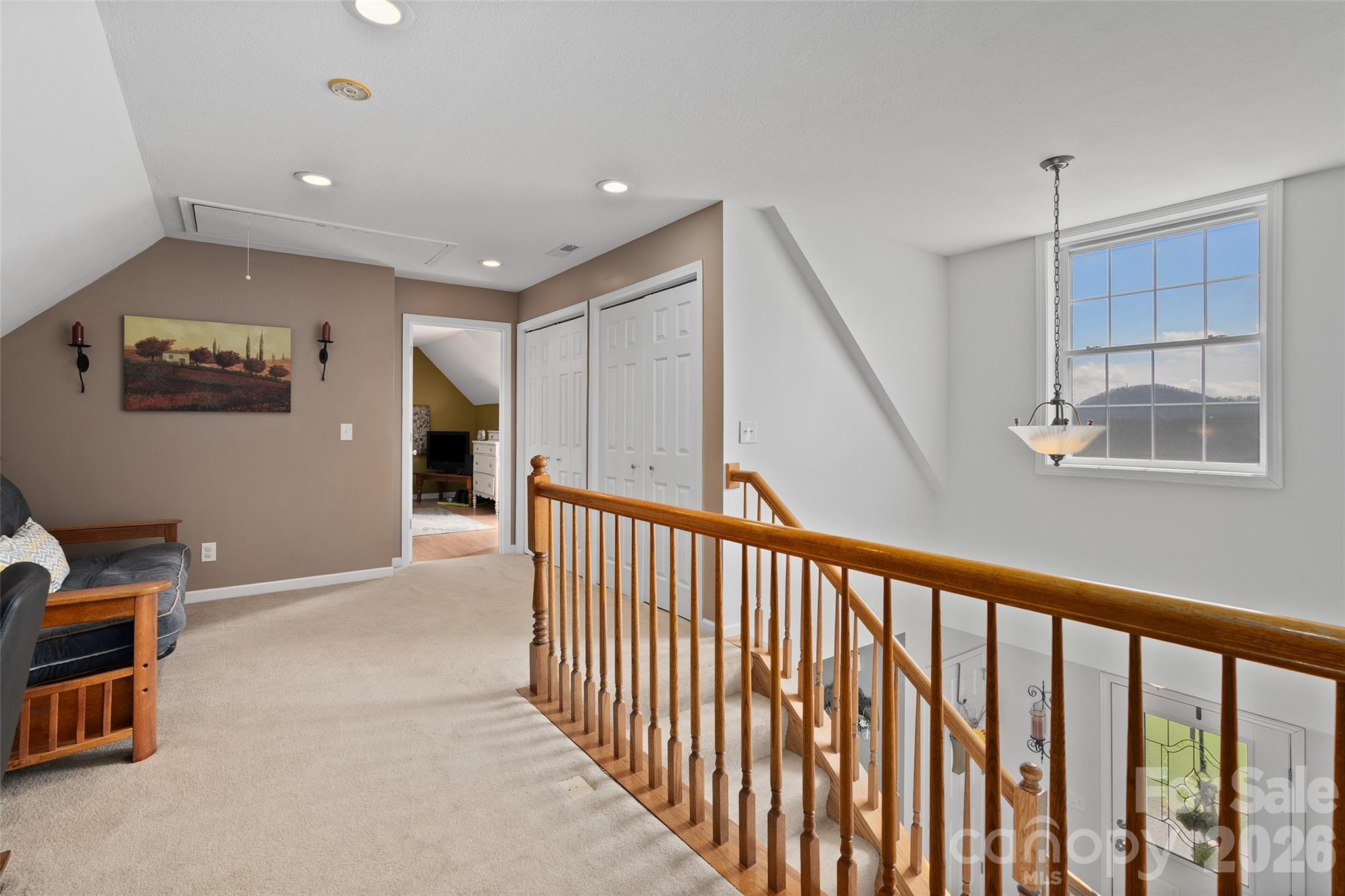 371 Ned Cove Road Waynesville, NC 28785 - Photo 33 of 44 a view of a hallway with workspace