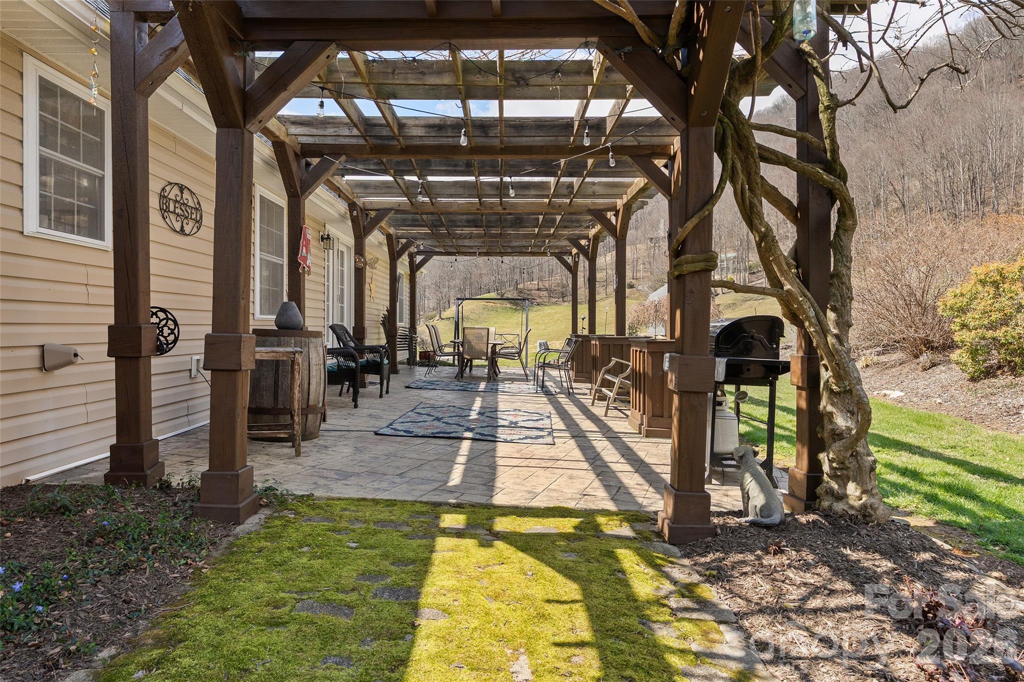 371 Ned Cove Road Waynesville, NC 28785 - Photo 37 of 44 a view of a large hall with a fountain