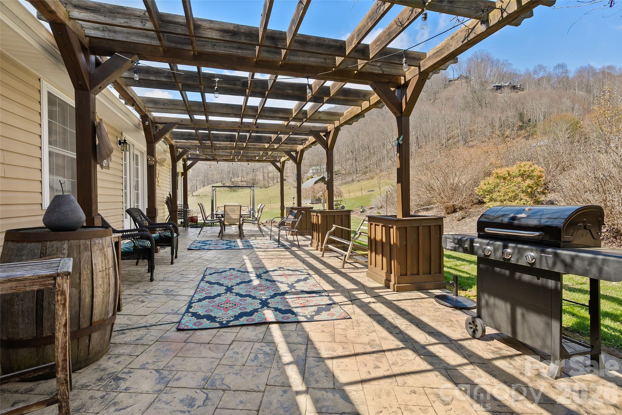 371 Ned Cove Road Waynesville, NC 28785 - Photo 38 of 44 a view of a room with wooden floor