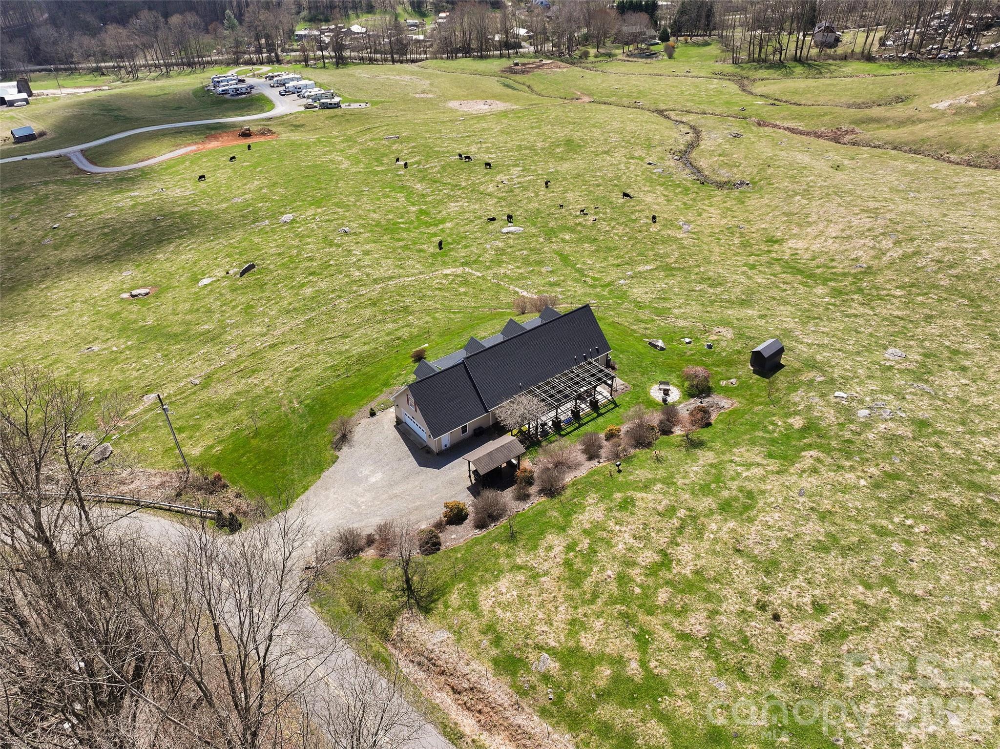 371 Ned Cove Road Waynesville, NC 28785 - Photo 43 of 44 a view of a yard with an outdoor space