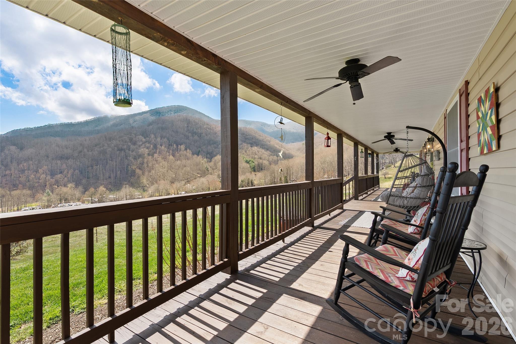 371 Ned Cove Road Waynesville, NC 28785 - Photo 6 of 44 a view of a balcony with furniture