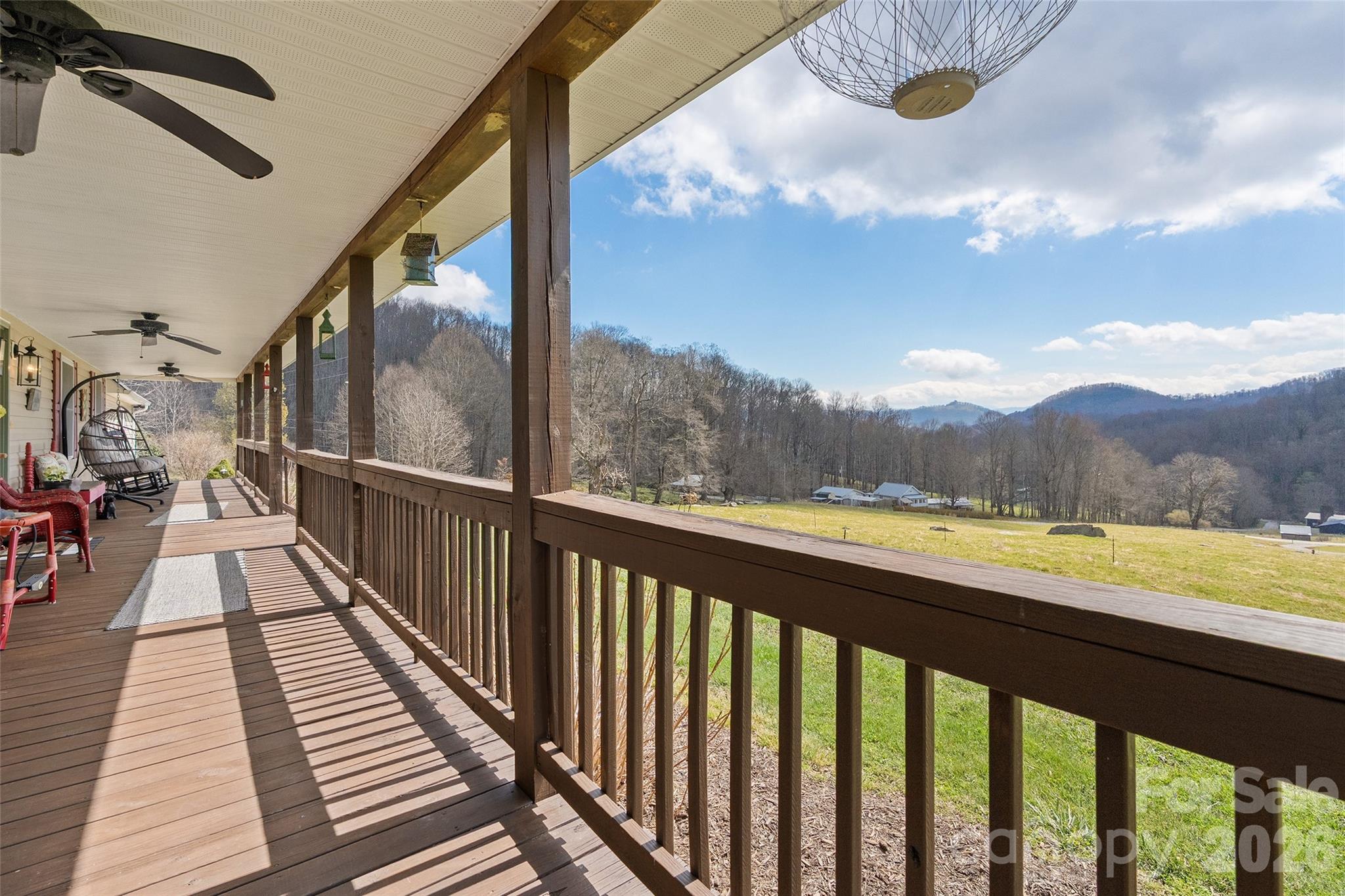 371 Ned Cove Road Waynesville, NC 28785 - Photo 7 of 44 a view of balcony with furniture