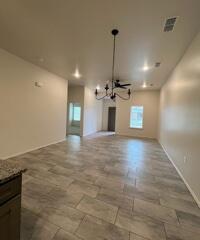 2611 136th Street Lubbock, TX 79423 - Photo 4 of 13 a view of a kitchen with a sink