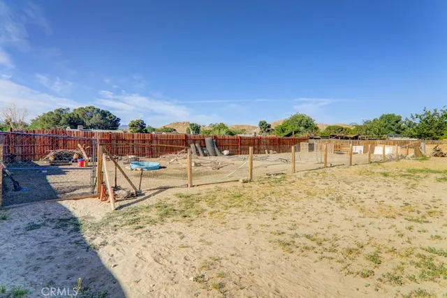 a view of lake with a yard