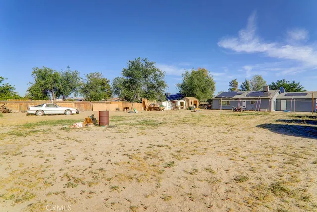 swimming pool view with a lake view