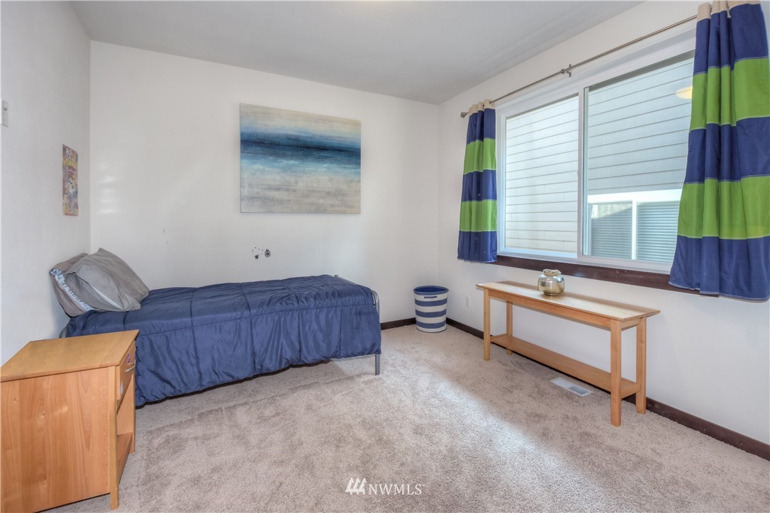 17503 3rd Avenue Southeast Bothell, WA 98012 - Photo 14 of 22 a room with furniture and window