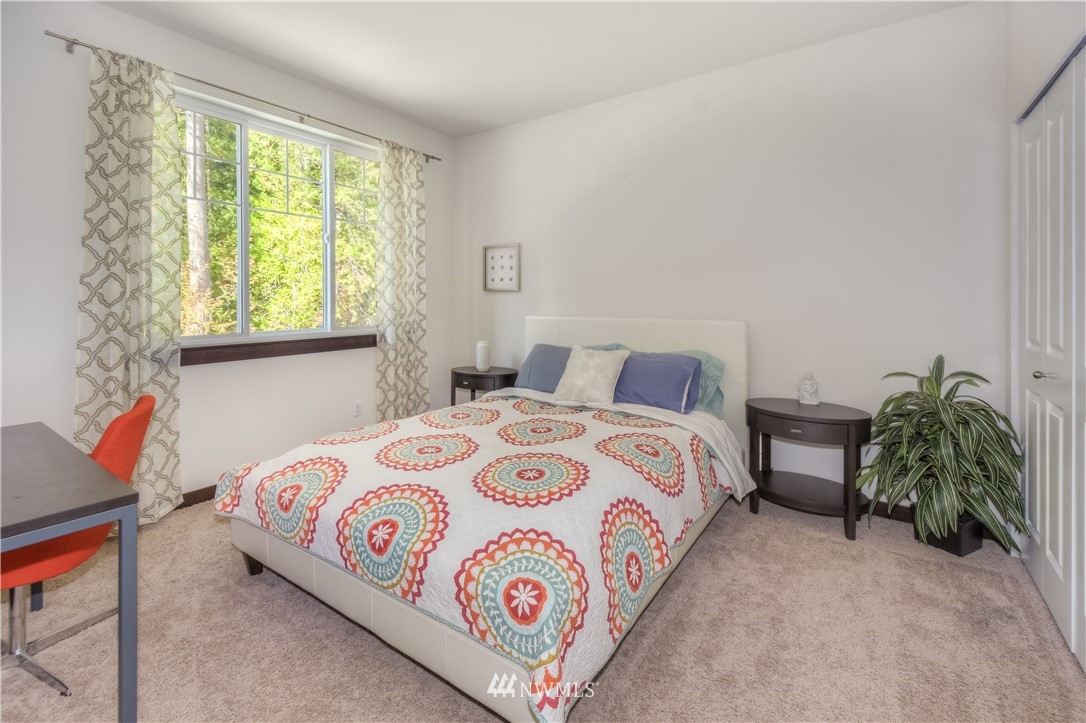 17503 3rd Avenue Southeast Bothell, WA 98012 - Photo 16 of 22 a bedroom with a bed and a window