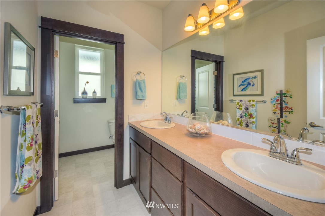 17503 3rd Avenue Southeast Bothell, WA 98012 - Photo 17 of 22 a bathroom with a sink and a mirror
