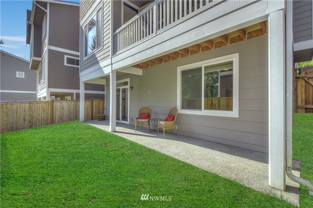 17503 3rd Avenue Southeast Bothell, WA 98012 - Photo 22 of 22 a view of house with backyard and outdoor seating