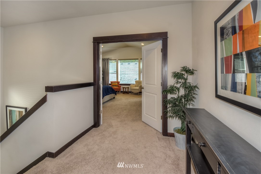 17503 3rd Avenue Southeast Bothell, WA 98012 - Photo 10 of 22 a view of a hallway to a livingroom and a livingroom with furniture