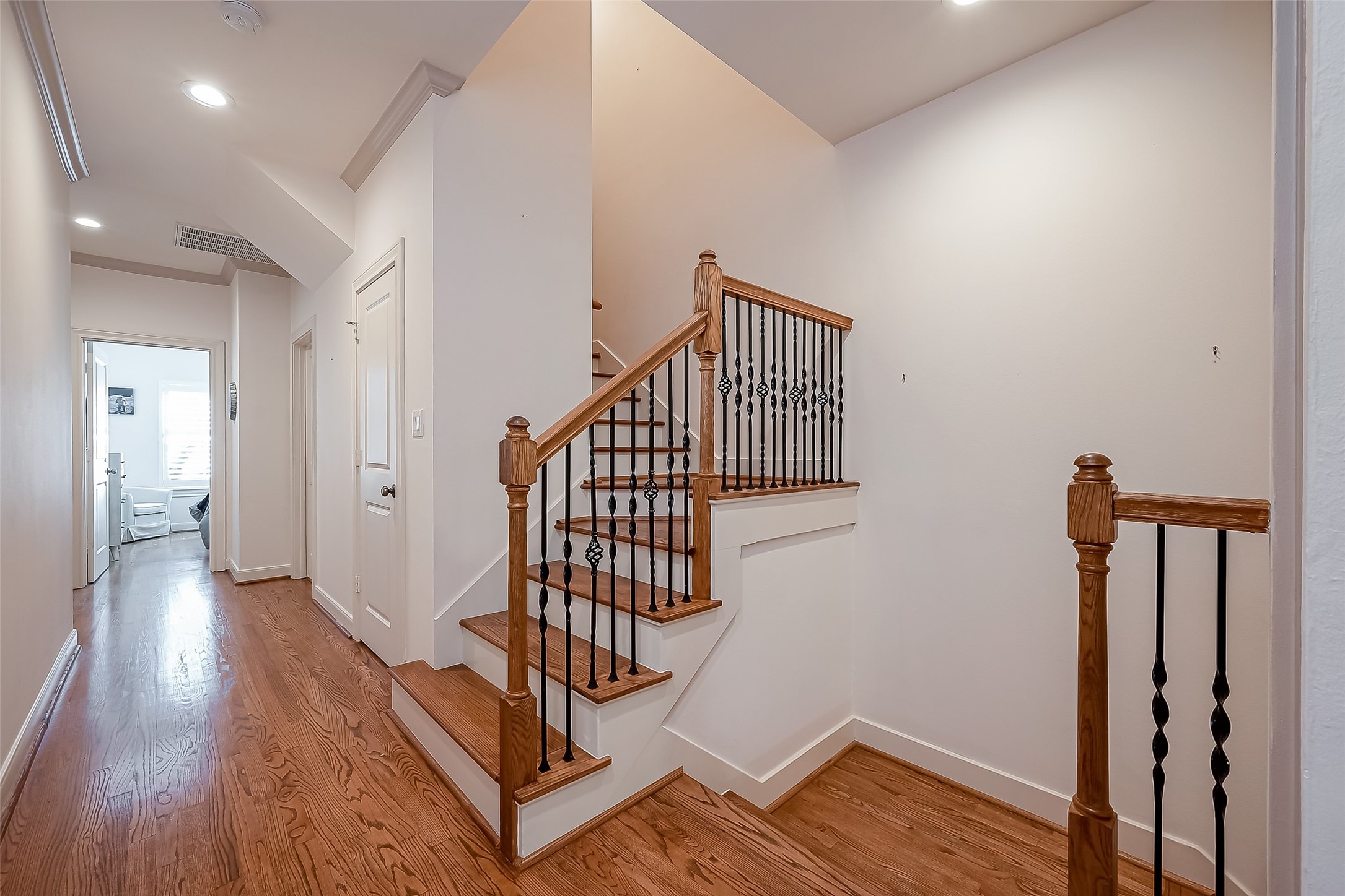 56 Riva Row The Woodlands, TX 77380 - Photo 19 of 36 a view of entryway with wooden floor