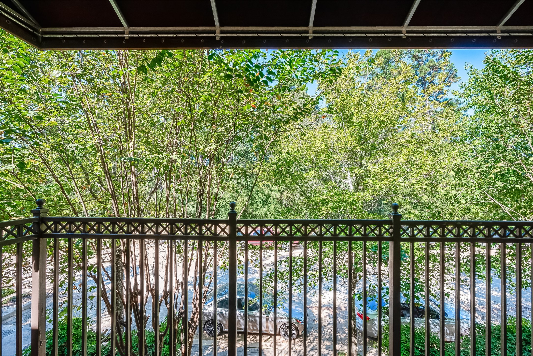 56 Riva Row The Woodlands, TX 77380 - Photo 34 of 36 a view of a backyard