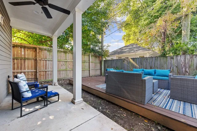 a view of a balcony with furniture