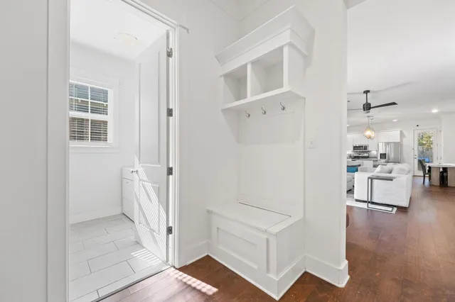 a view of kitchen with furniture and a refrigerator