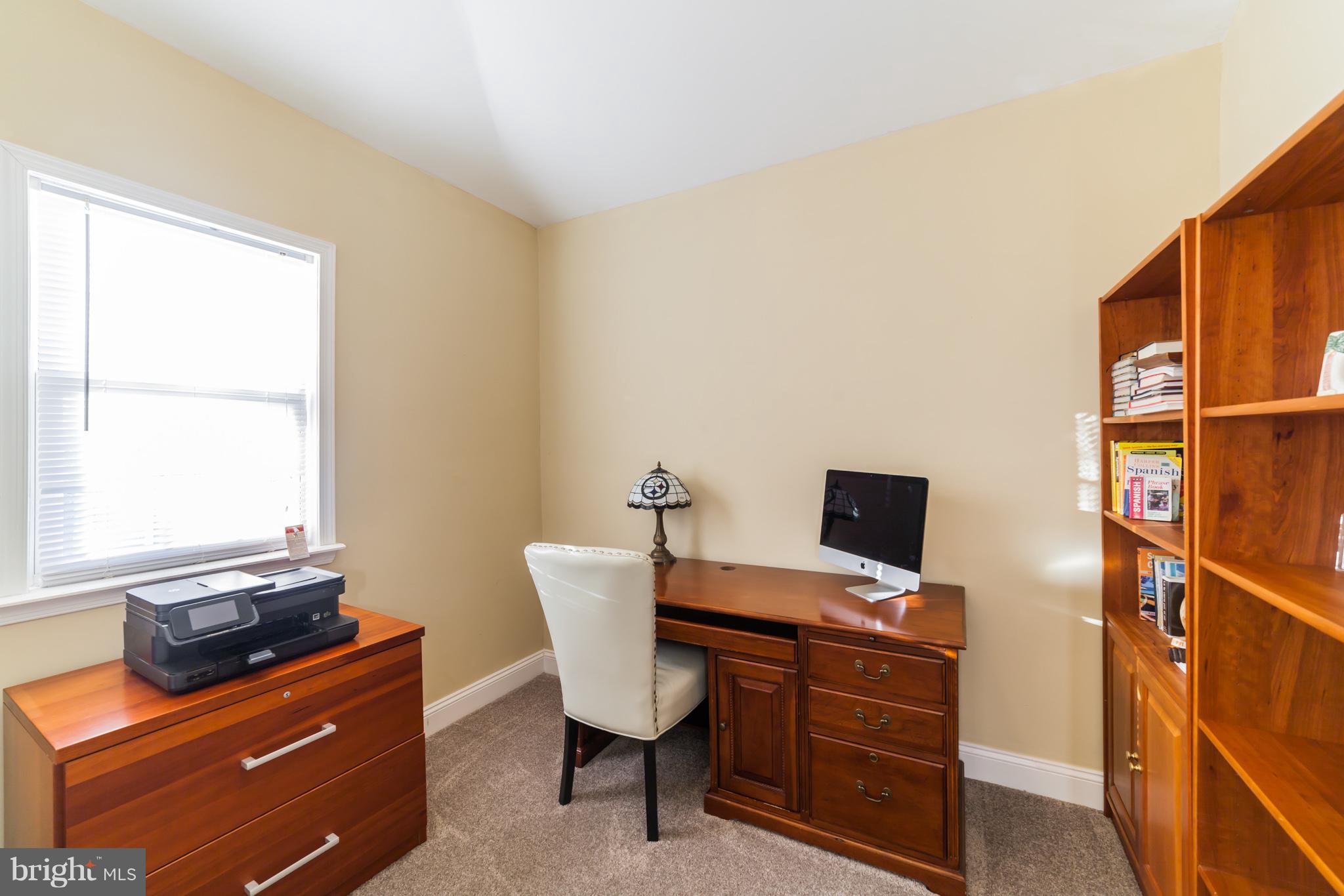 11704 Goodloe Road Silver Spring, MD 20906 - Photo 20 of 30 a view of a workspace with furniture