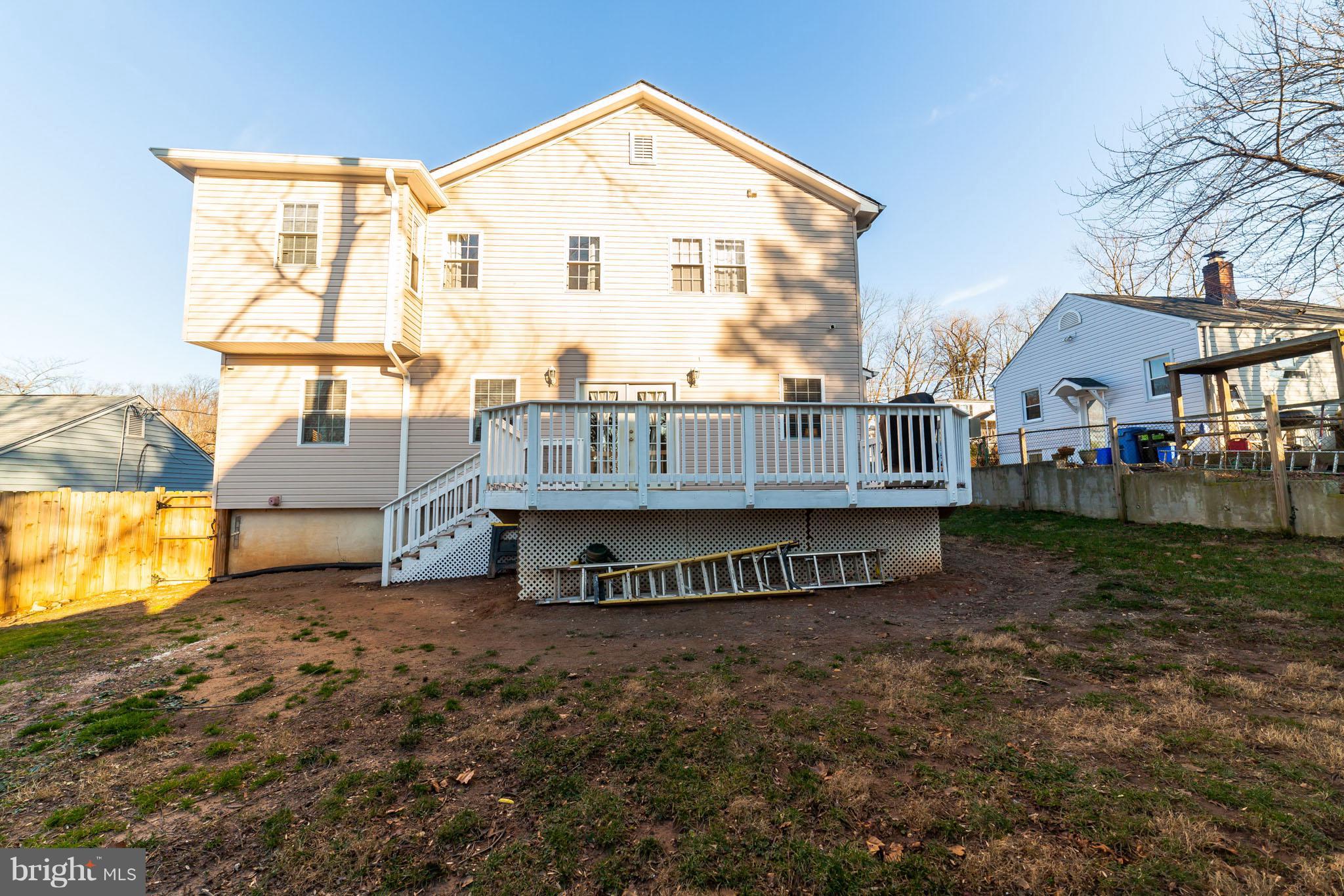 11704 Goodloe Road Silver Spring, MD 20906 - Photo 3 of 30 a view of residential house with wooden fence