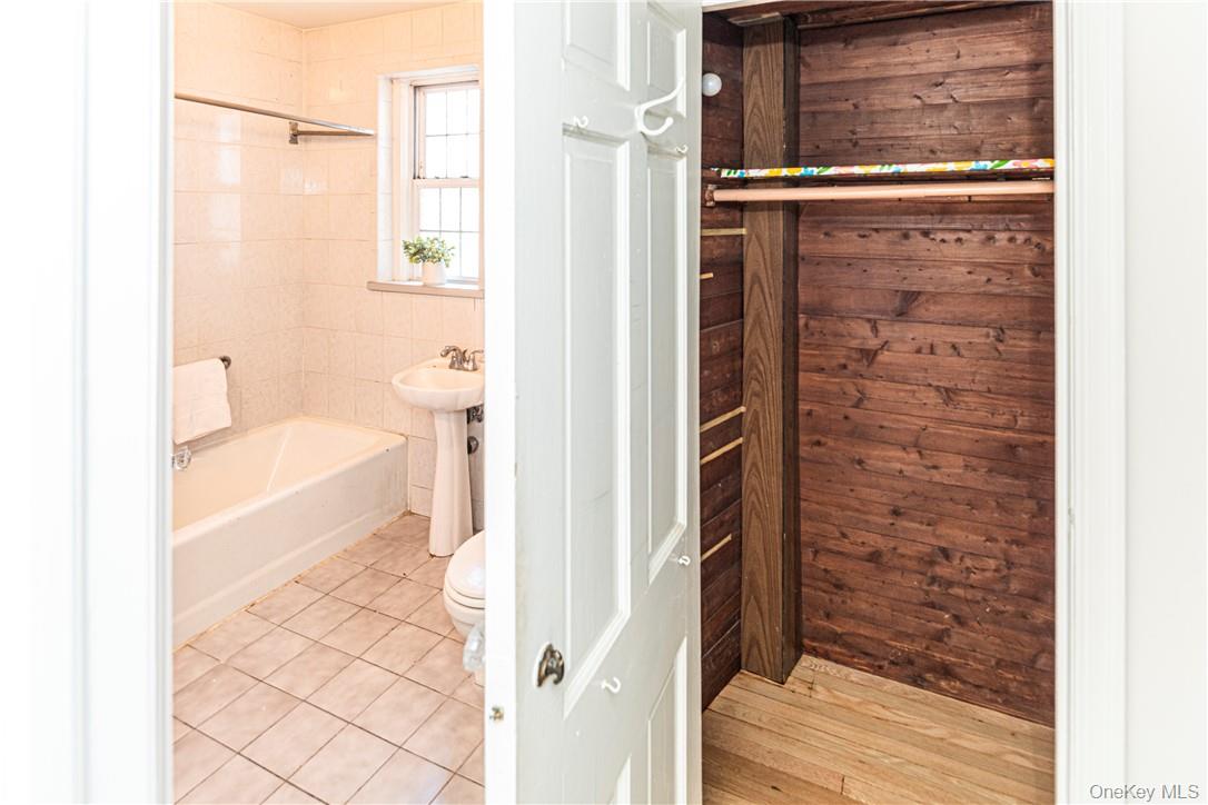 270 Bronxville Road, Unit B63 Bronxville, NY 10708 - Photo 18 of 25 a bathroom with a bathtub and a shower