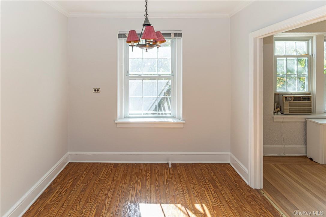 270 Bronxville Road, Unit B63 Bronxville, NY 10708 - Photo 10 of 25 a very nice looking room with wooden floor and windows