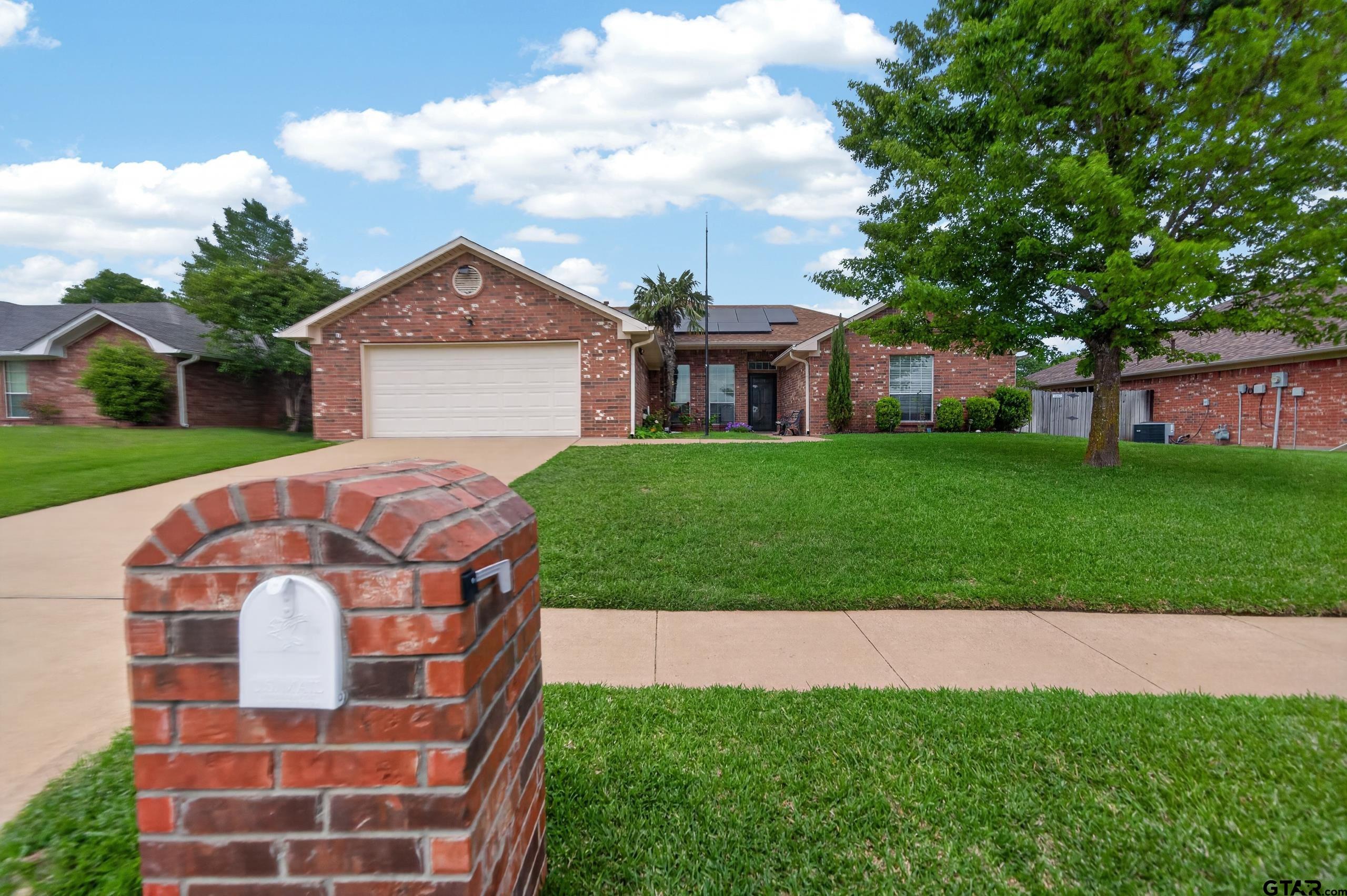 11274 Meadows Drive Flint, TX 75762 - Photo 1 of 43 a front view of a house with a yard