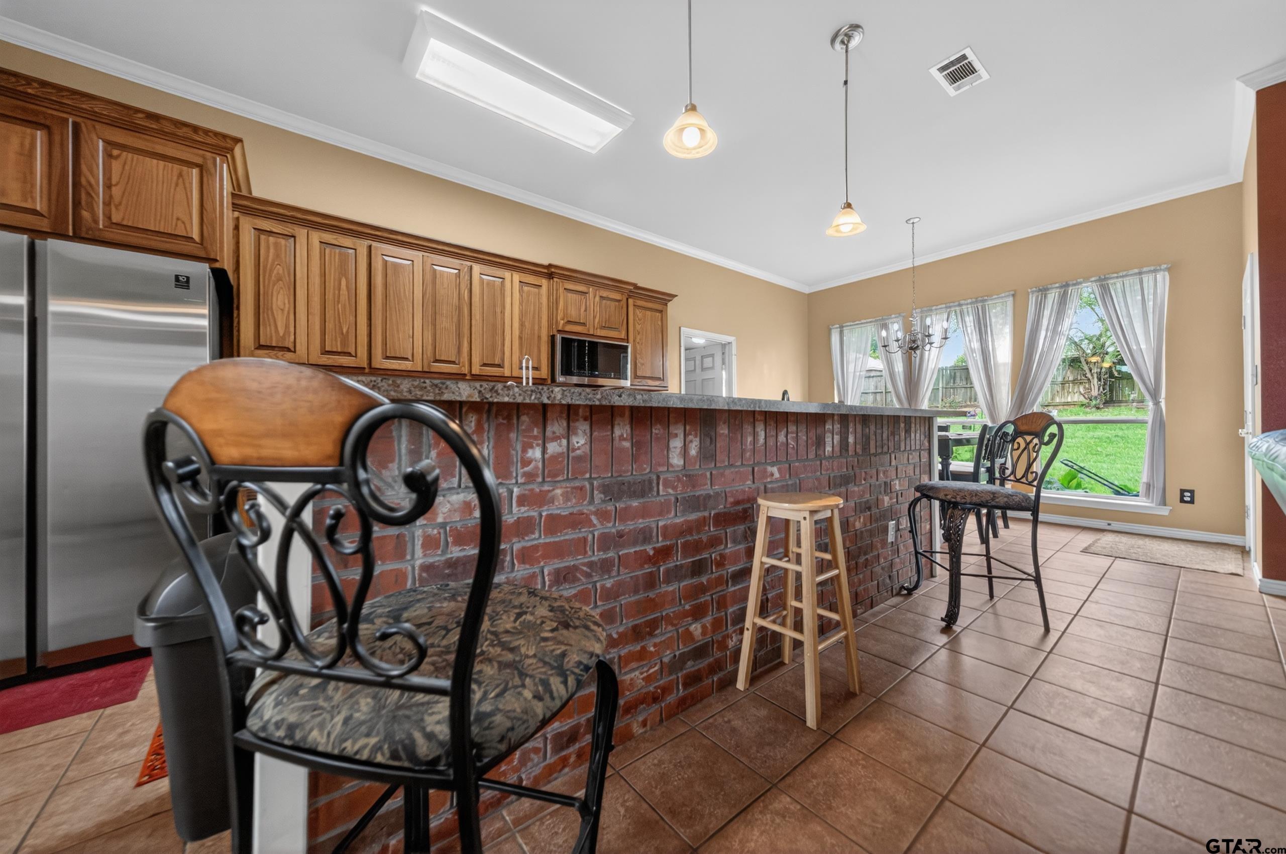 11274 Meadows Drive Flint, TX 75762 - Photo 12 of 43 a view of a dining room with furniture window and outside view