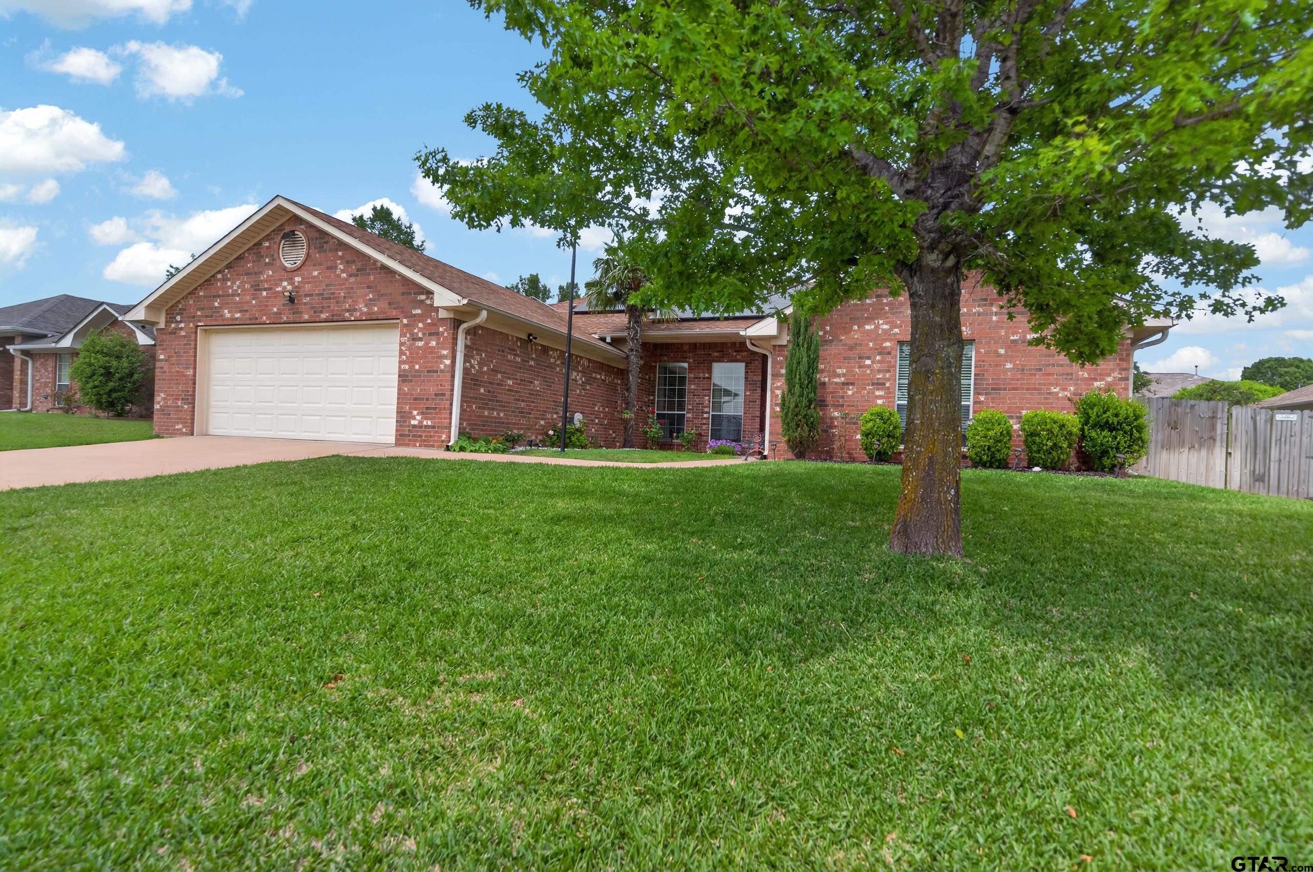 11274 Meadows Drive Flint, TX 75762 - Photo 2 of 43 a house with green field in front of it