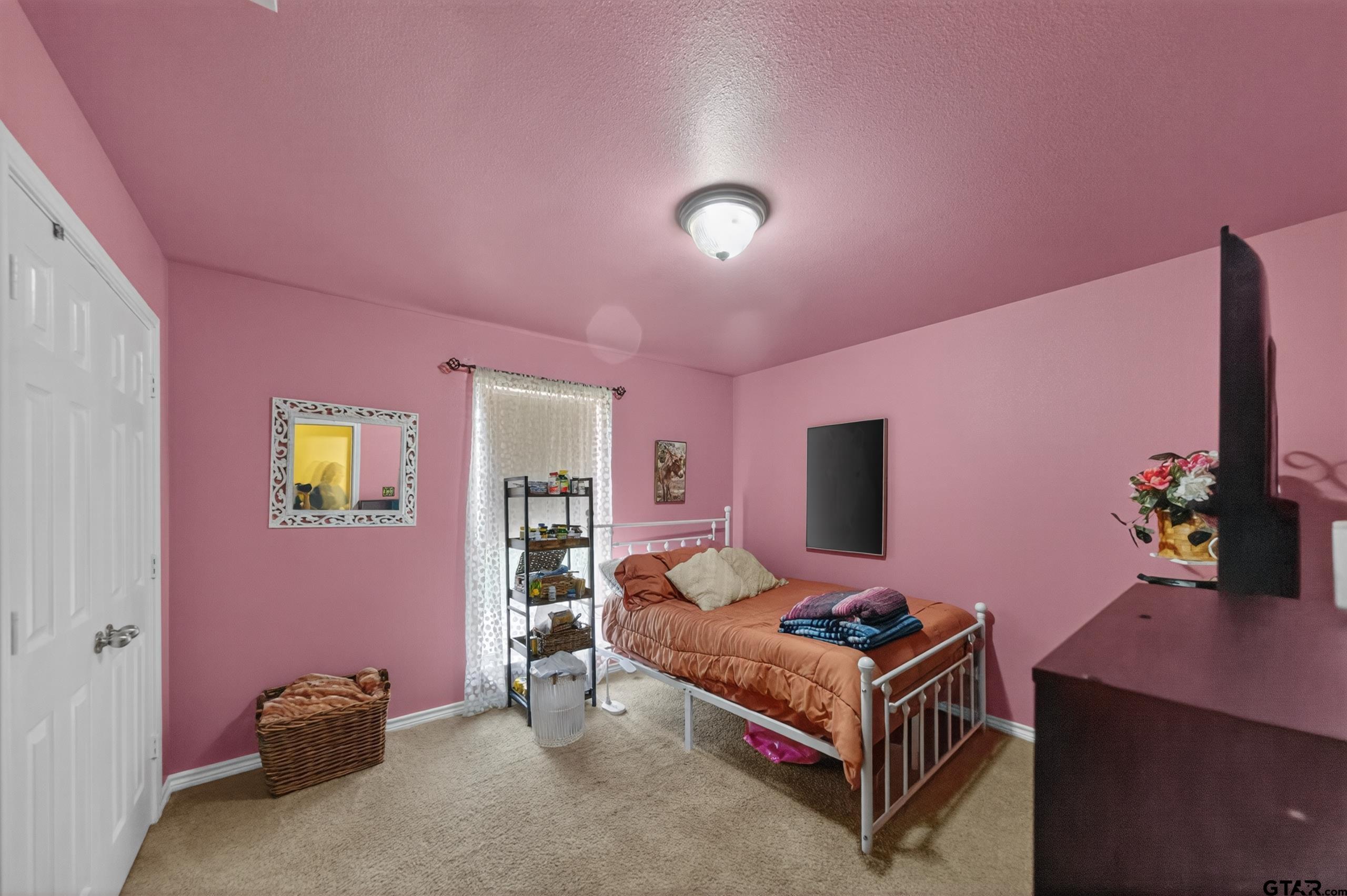 11274 Meadows Drive Flint, TX 75762 - Photo 35 of 43 a bedroom with a bed and a desk