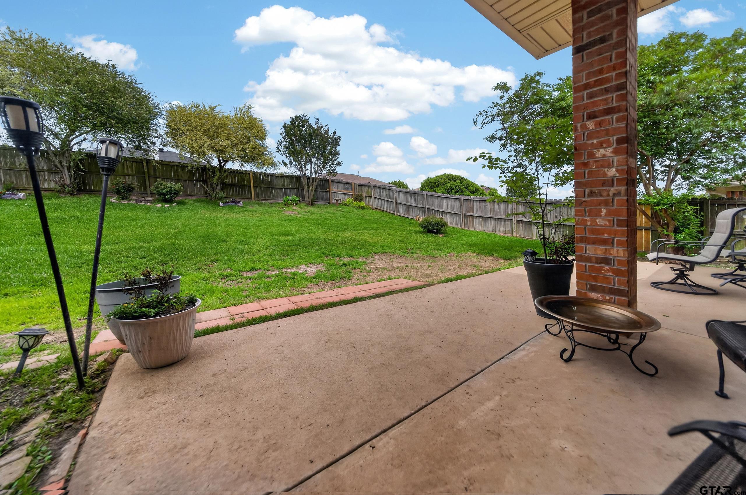 11274 Meadows Drive Flint, TX 75762 - Photo 39 of 43 a view of a backyard with sitting area