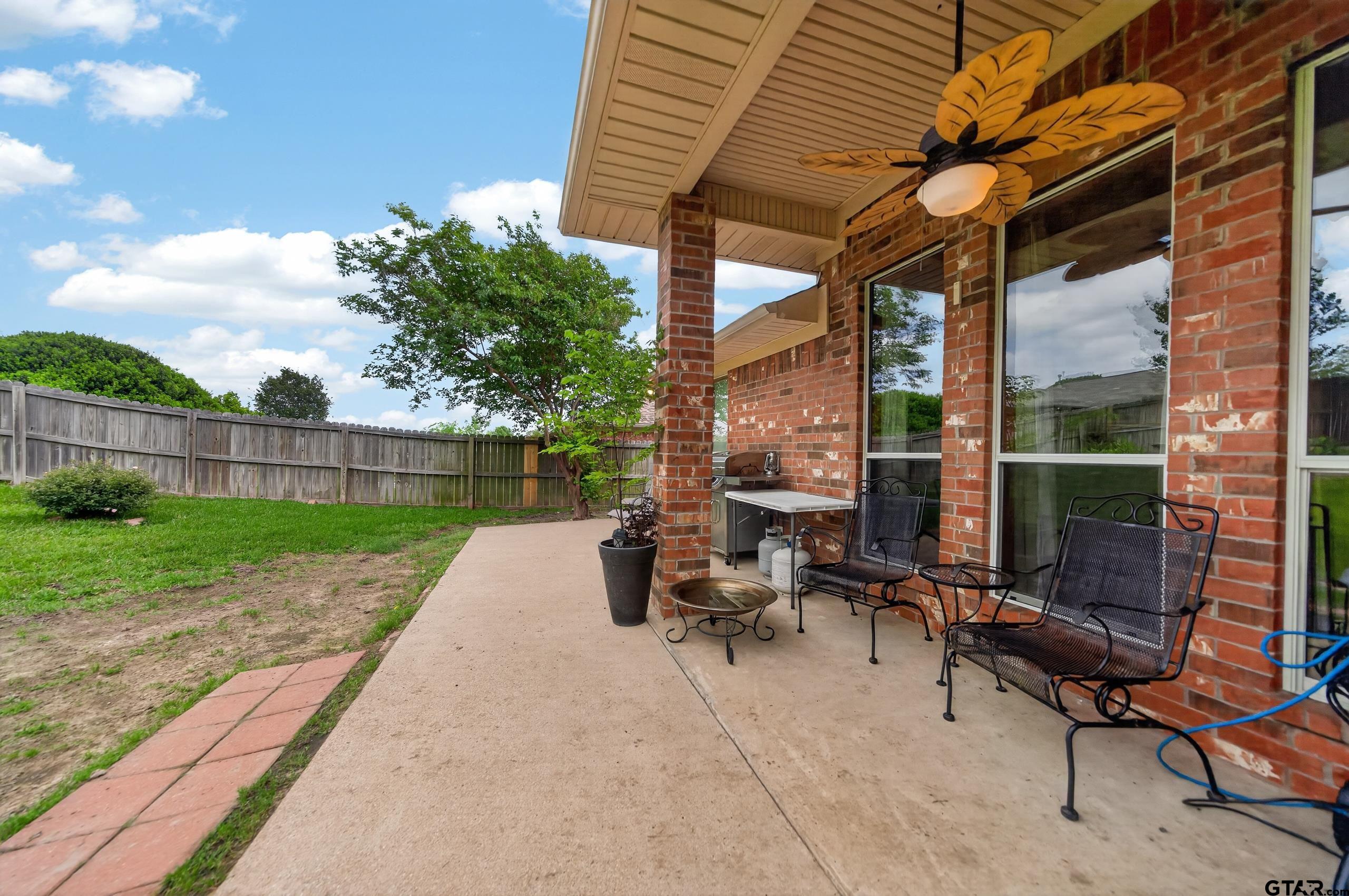 11274 Meadows Drive Flint, TX 75762 - Photo 43 of 43 a view of backyard with sitting area and tub