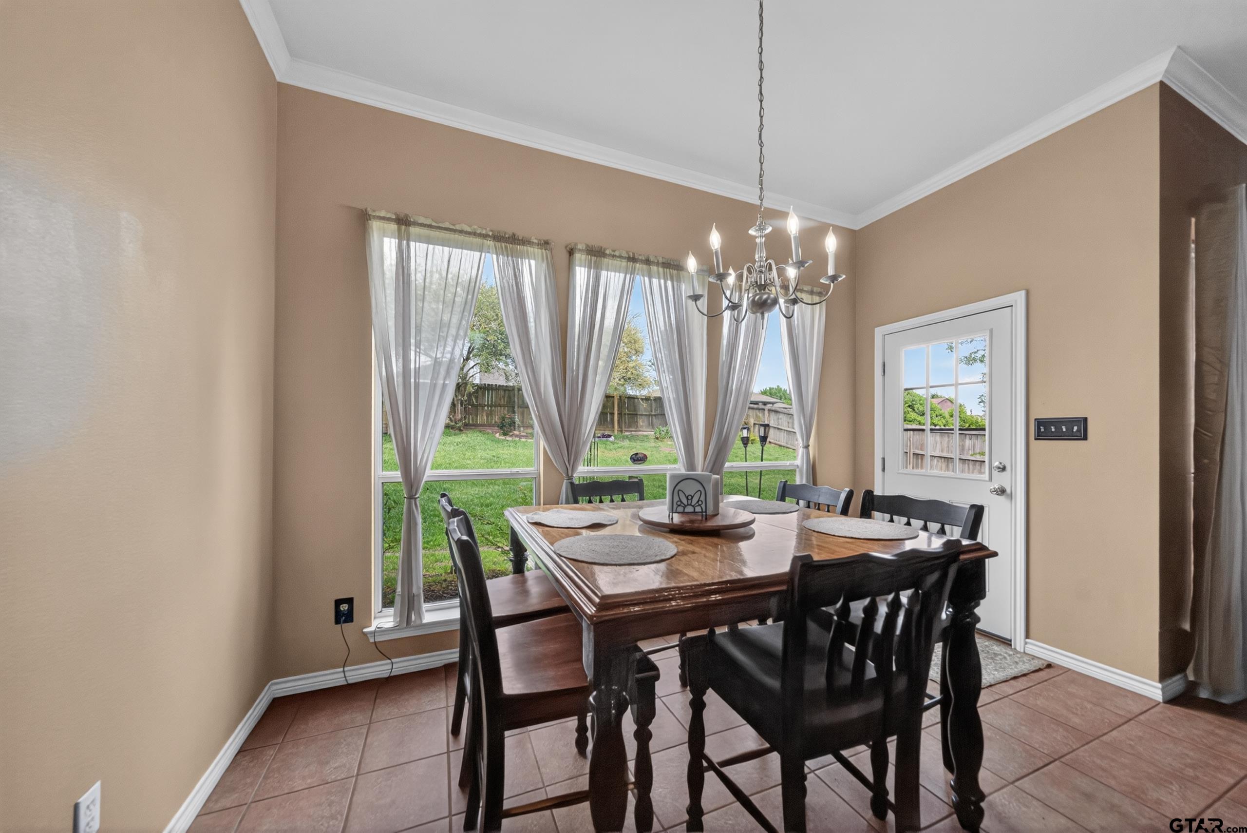 11274 Meadows Drive Flint, TX 75762 - Photo 5 of 43 a dining room with furniture window and outside view