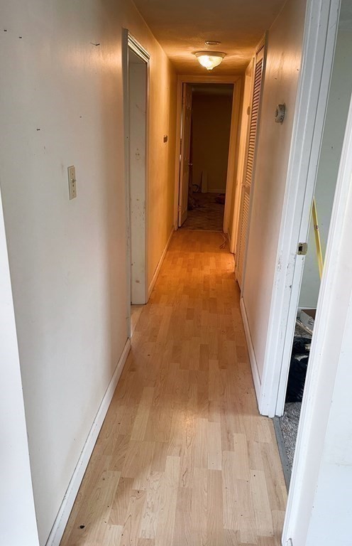 270 Littleton Road, Unit 109 Chelmsford, MA 01824 - Photo 13 of 41 a view of gallery with wooden floor