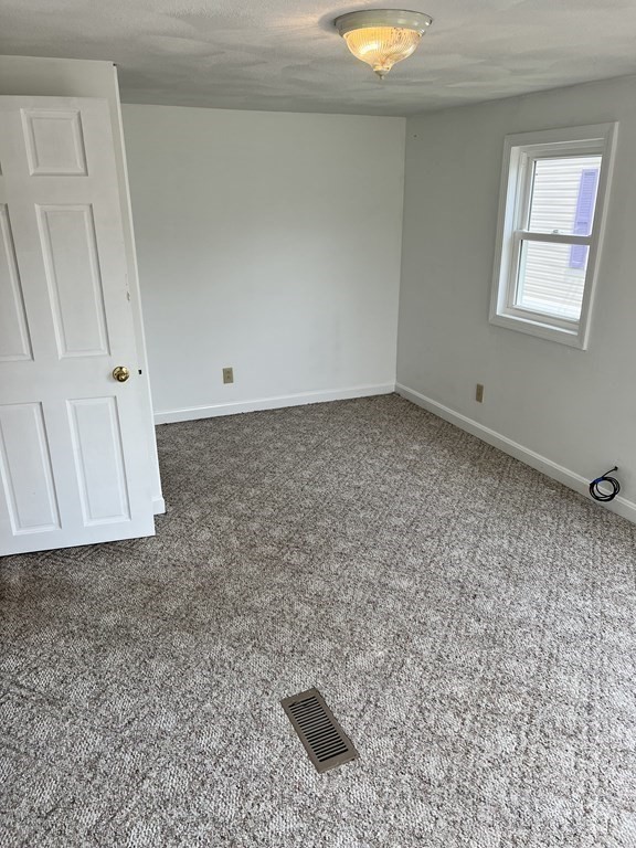 270 Littleton Road, Unit 109 Chelmsford, MA 01824 - Photo 17 of 41 a very nice looking room with a stove