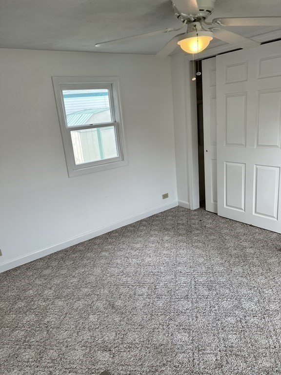 270 Littleton Road, Unit 109 Chelmsford, MA 01824 - Photo 20 of 41 a view of an empty room with a window