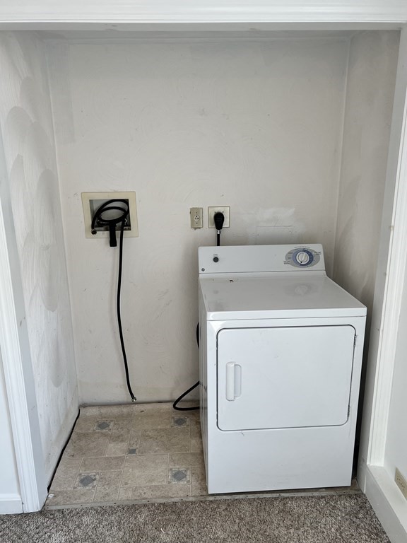 270 Littleton Road, Unit 109 Chelmsford, MA 01824 - Photo 27 of 41 a utility room with dryer and washer