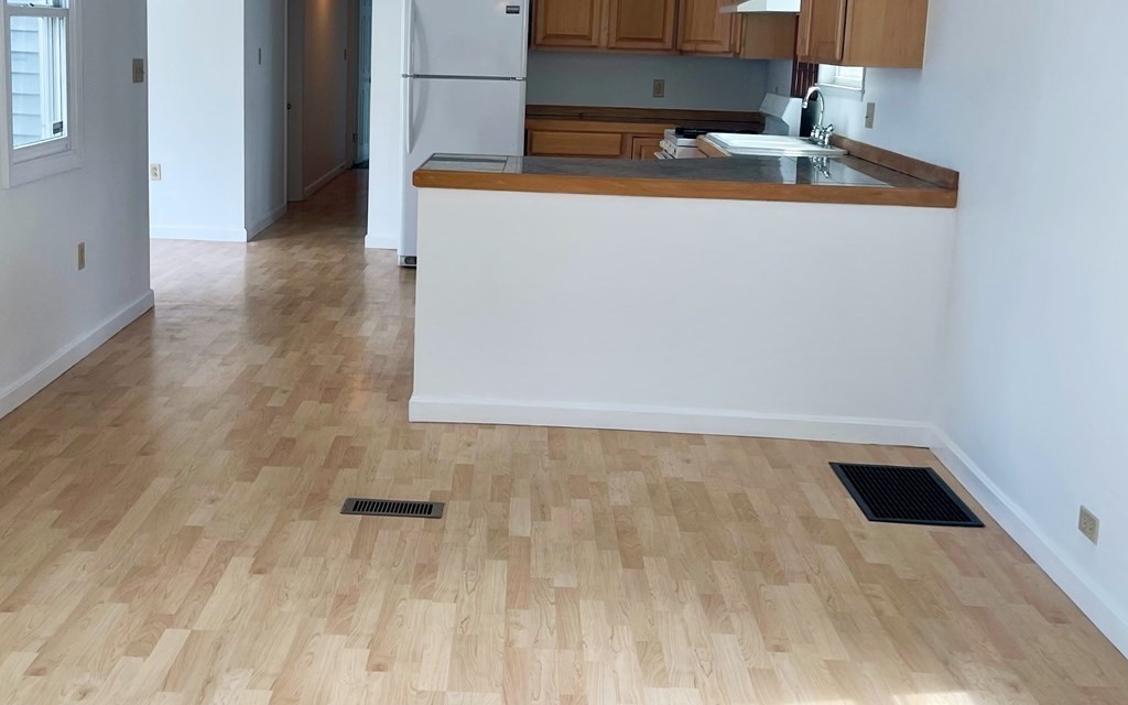 270 Littleton Road, Unit 109 Chelmsford, MA 01824 - Photo 3 of 41 a utility room with a sink