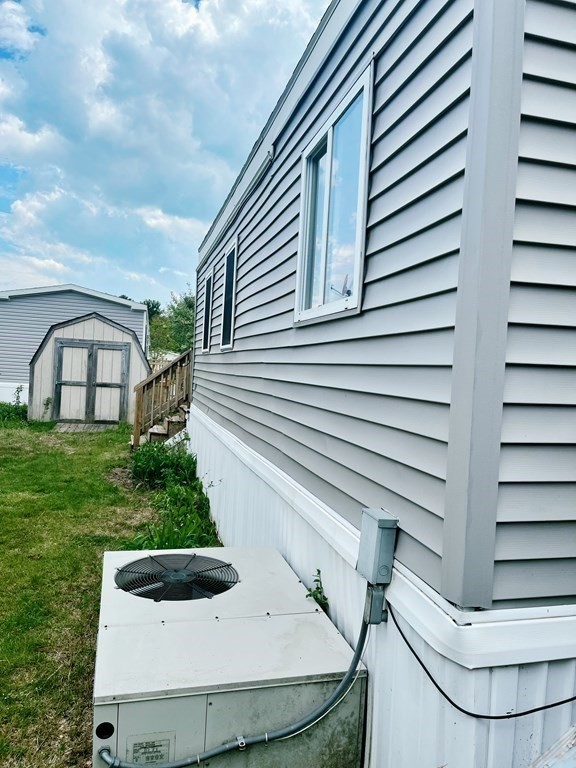 270 Littleton Road, Unit 109 Chelmsford, MA 01824 - Photo 35 of 41 a house view with a garden space