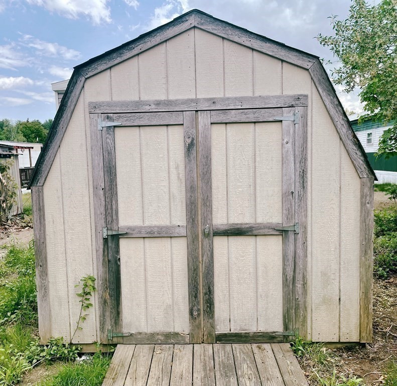270 Littleton Road, Unit 109 Chelmsford, MA 01824 - Photo 36 of 41 a view of a house with backyard and entryway