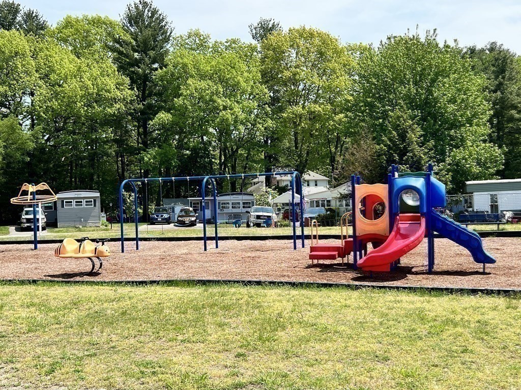 270 Littleton Road, Unit 109 Chelmsford, MA 01824 - Photo 39 of 41 a view of park with slide