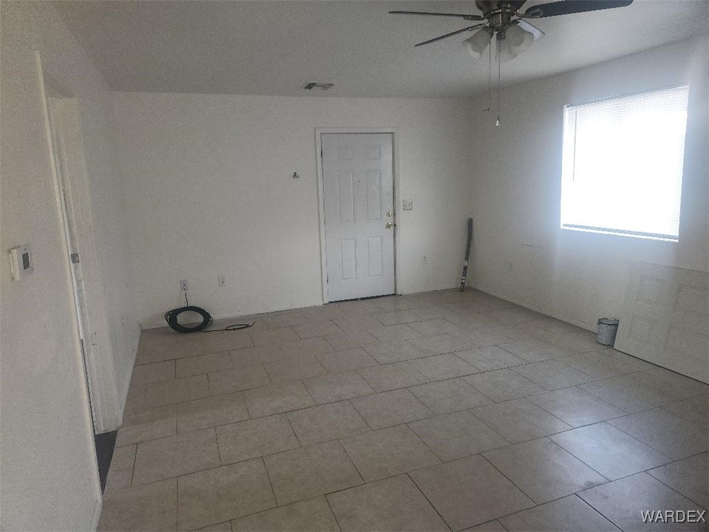 352 Rio Grande Court Bullhead City, AZ 86442 - Photo 7 of 14 a view of an empty room with a window
