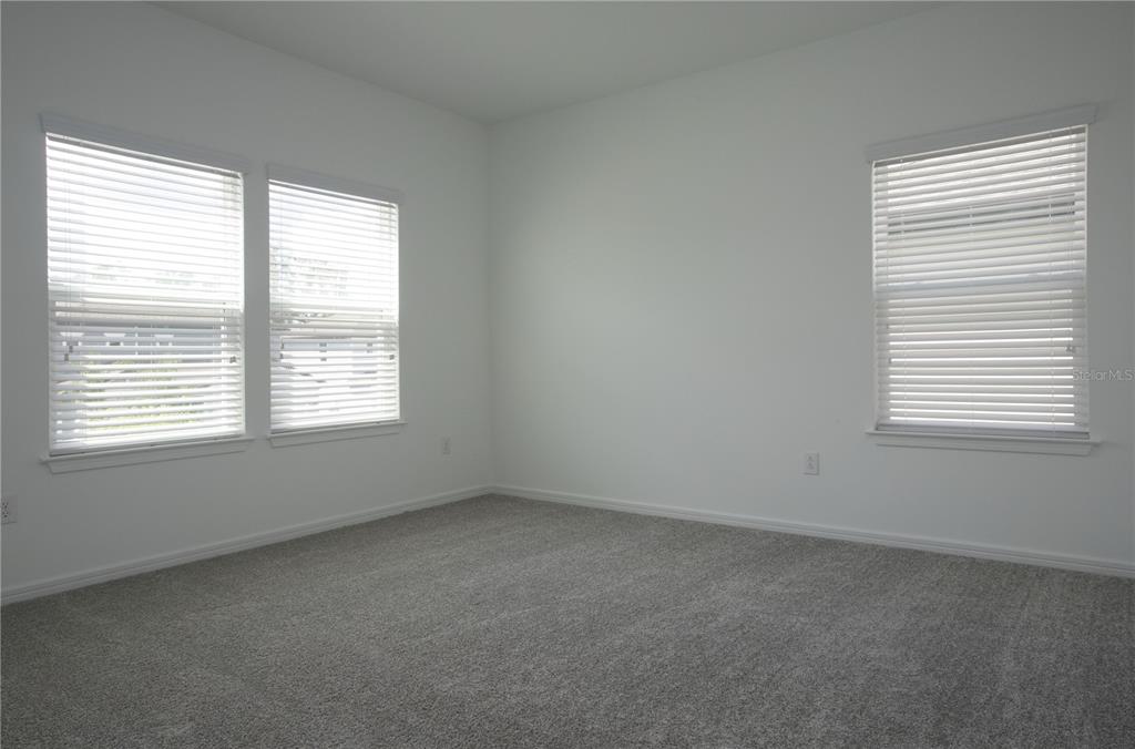 14184 Hammock Crest Way Riverview, FL 33569 - Photo 43 of 54 an empty room with a window