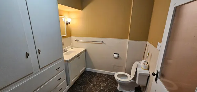 a view of front door and wooden floor