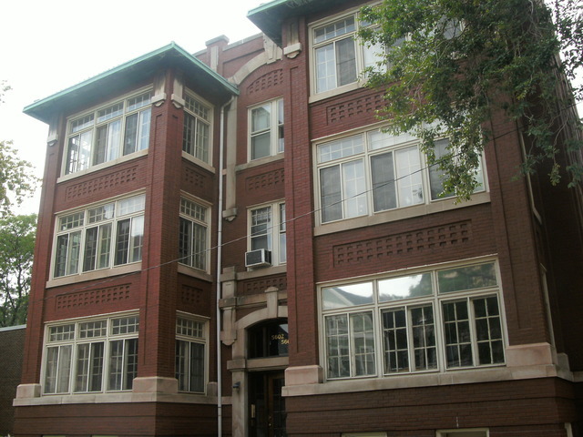 1367 East 56th Street, Unit 2 Chicago, IL 60637 - Photo 1 of 8 a front view of a building with a window