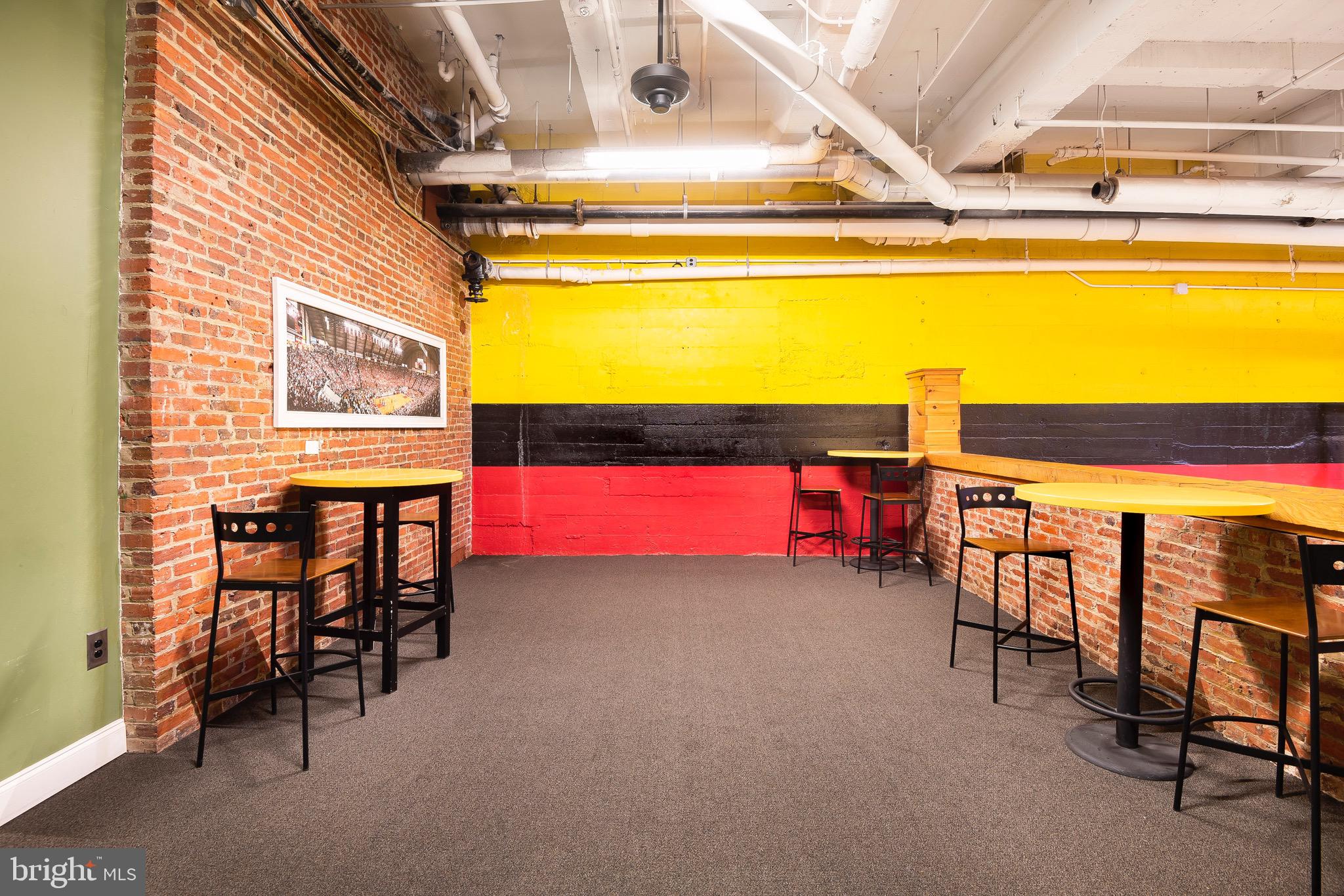 301 North Charles Street, Unit 1BR Baltimore, MD 21202 - Photo 29 of 48 a view of a room with table and chairs