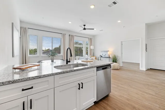 a kitchen with sink and window