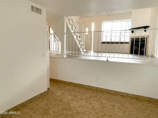 a view of a kitchen with a sink